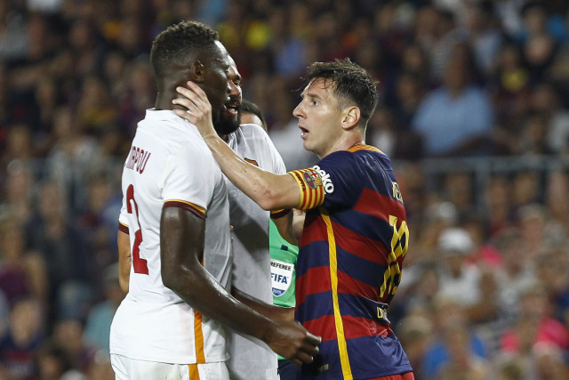 a furious messi grabbed yanga mbiwa by the throat after clashing with the defender before other players rushed over to intervene photo afp a furious messi grabbed yanga mbiwa by the throat after clashing with the defender before other players rushed over to intervene photo afp