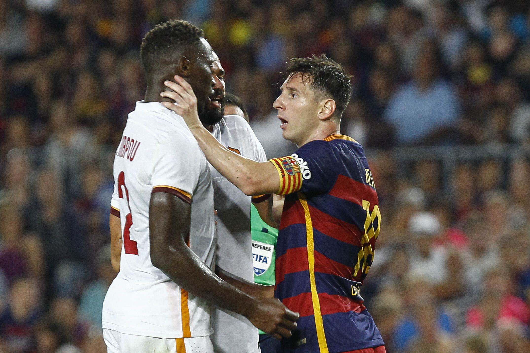 a furious messi grabbed yanga mbiwa by the throat after clashing with the defender before other players rushed over to intervene photo afp