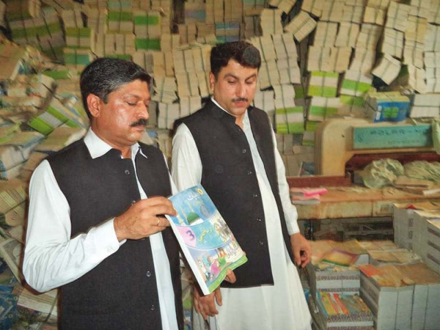 officials of the anti corruption establishment found a text book board s warehouse filled to the brim with books meant to have been distributed to schools photo express officials of the anti corruption establishment found a text book board s warehouse filled to the brim with books meant to have been distributed to schools photo express