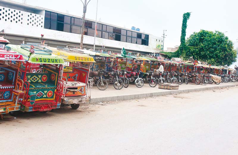 the traffic police claims it wants to take all the three wheeler motorcycle qingqi rickshaws off the roads but have no space where they can impound the 40 000 vehicles photo ppi