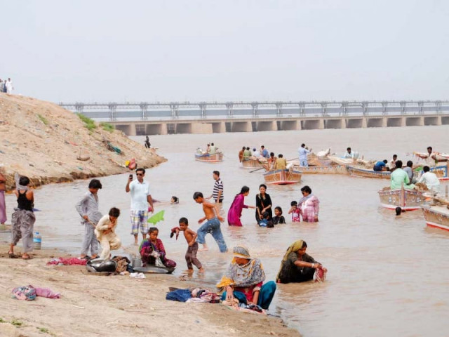 people take dips and enjoy boat rides near jamshoro despite the rising water levels photo ppi people take dips and enjoy boat rides near jamshoro despite the rising water levels photo ppi