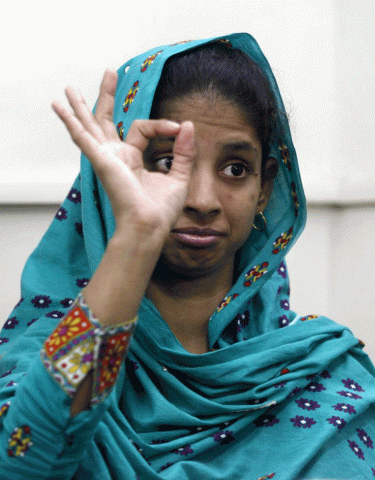 geeta gestures as she speaks in sign language at the bilquis edhi foundation in karachi photo reuters