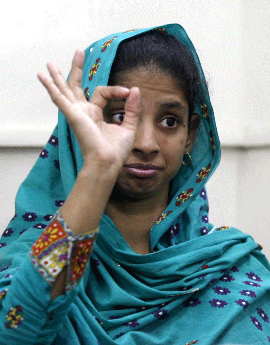 geeta gestures as she speaks in sign language at the bilquis edhi foundation in karachi photo reuters