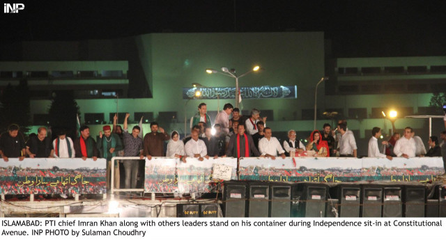 pti chief imran khan and party leadership stands atop a stage in front of the parliament house during their rally in islamabad on saturday photo inp pti chief imran khan and party leadership stands atop a stage in front of the parliament house during their rally in islamabad on saturday photo inp