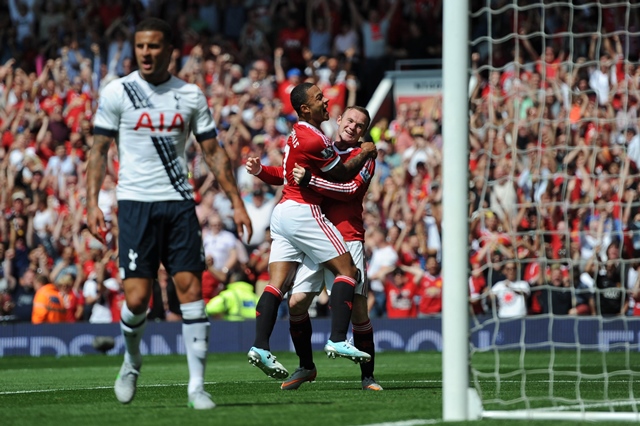 manchester united 039 s dutch midfielder memphis depay 2nd r celebrates with manchester united 039 s english striker wayne rooney r photo afp