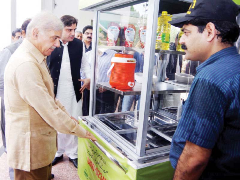 chief minister shahbaz sharif inspects a model cart on saturday photo inp