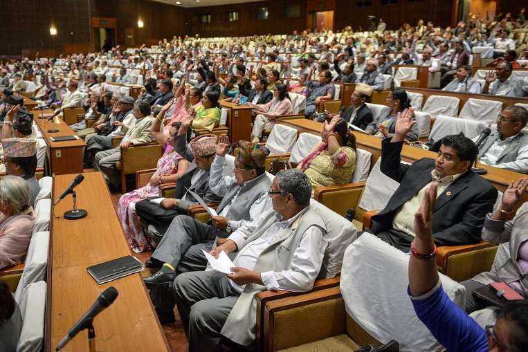 nepalese lawmakers meet at the national parliament in kathmandu on june 9 2015 photo afp