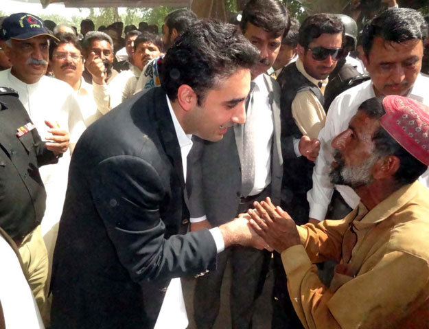 pakistan peoples party chairperson bilawal bhutto zardari speaks with a flood affected person during his visit to the flood hit areas of sindh on sunday photo pid