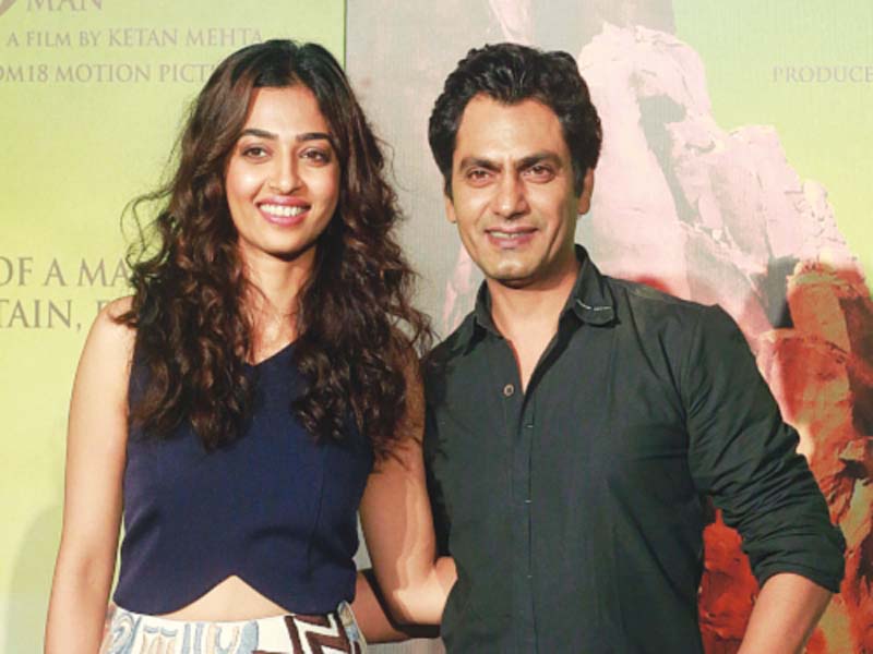 actor radhika apte plays nawazuddin s love interest in the film for which he sets about breaking a mountain photo file