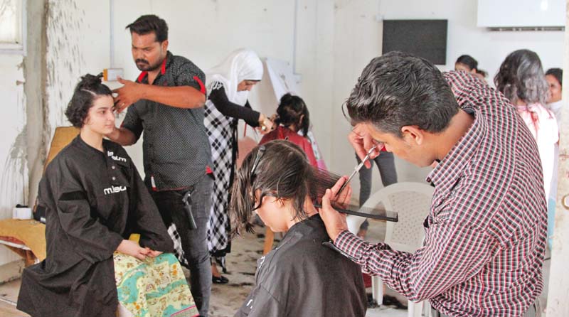 volunteers donate hair for patients of cancer and other illnesses who lose hair during treatment the pakistan youth forum has undertaken the task of collecting donated hair to make wigs for such patients photo aysha saleem express