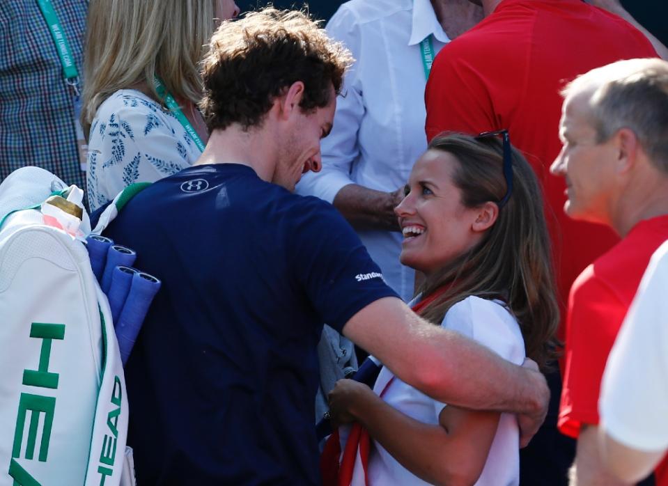britain 039 s andy murray l celebrates with his wife kim sears after beating france 039 s gilles simon in a davis cup match at the queen 039 s club in west london on july 19 2015 photo afp