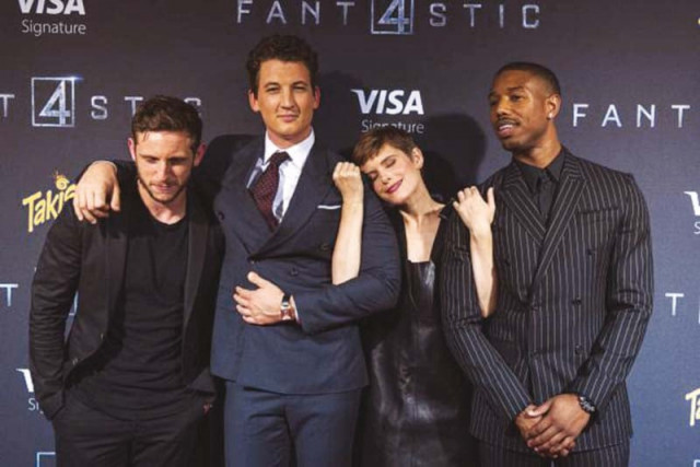 l r jamie bell miles teller kate mara and michael b jordan pose at the premiere of fantastic four photo file l r jamie bell miles teller kate mara and michael b jordan pose at the premiere of fantastic four photo file