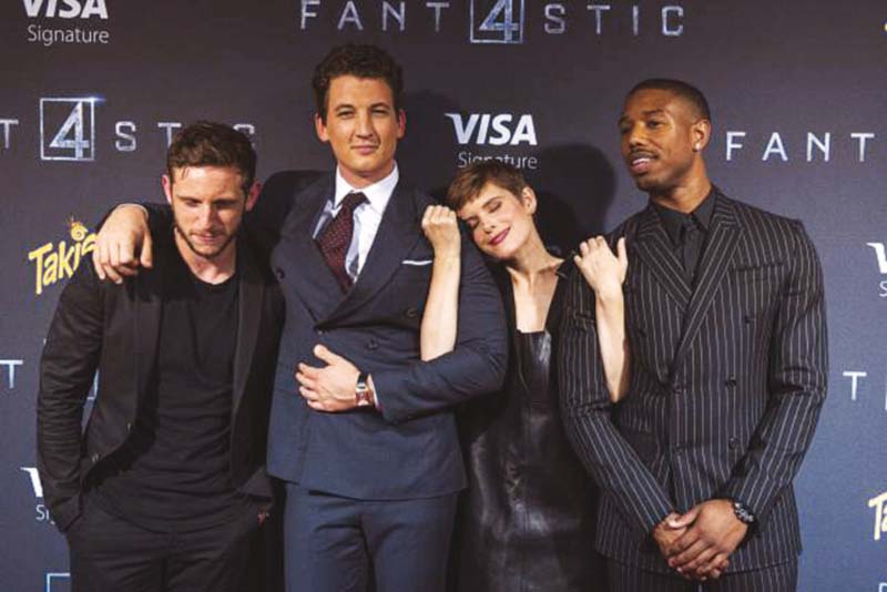 l r jamie bell miles teller kate mara and michael b jordan pose at the premiere of fantastic four photo file