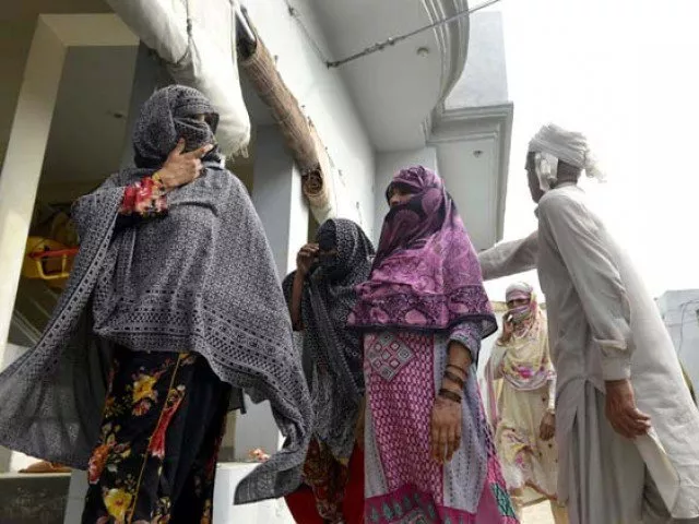 villagers gather at a house after the authorities announced a judicial inquiry into a massive child abuse scandal in hussain khanwala village some 55 kms southwest of lahore on august 9 2015 photo afp villagers gather at a house after the authorities announced a judicial inquiry into a massive child abuse scandal in hussain khanwala village some 55 kms southwest of lahore on august 9 2015 photo afp