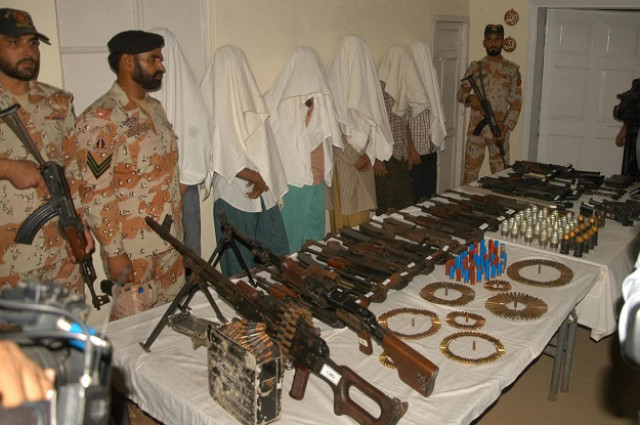 a huge cache of weapons recovered from the suspects photo express a huge cache of weapons recovered from the suspects photo express