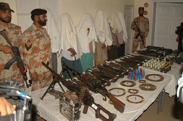 a huge cache of weapons recovered from the suspects photo express