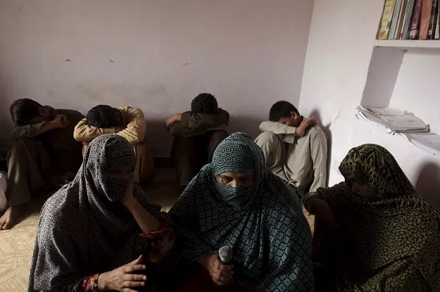 children whose families say have been abused hide their faces while their mothers are interviewed by a reuters correspondent in their village of husain khan wala photo reuters children whose families say have been abused hide their faces while their mothers are interviewed by a reuters correspondent in their village of husain khan wala photo reuters