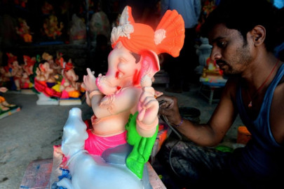 ganesha idols adorn indian town before hindu festival