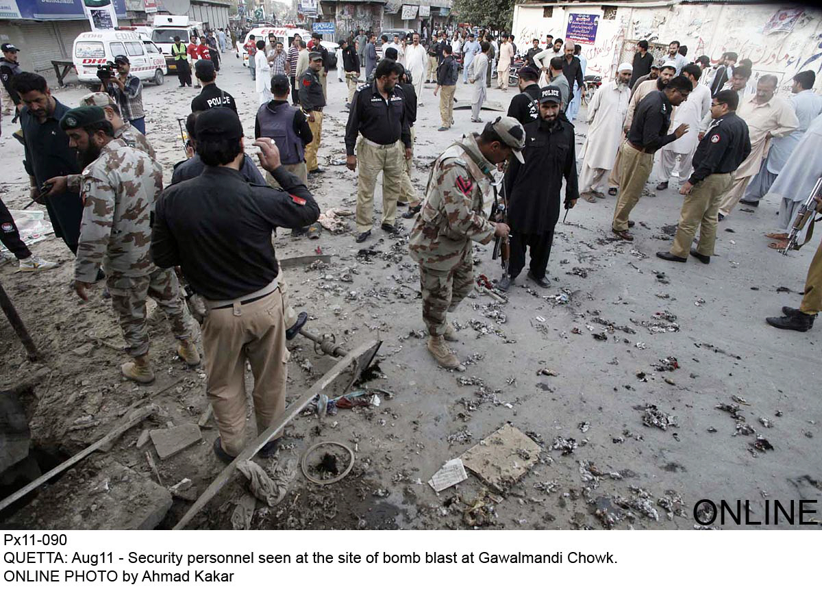 security personnel inspect the site of the blast in quetta on august 11 2015 photo online