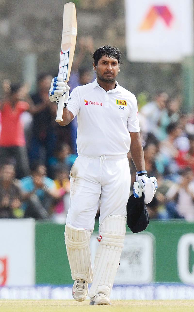 sangakkara will go down in test cricket history as one of the best ever players boasting records that are second to none but the great don bradman photo afp