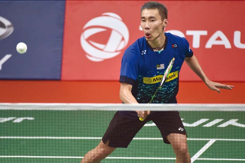 china s lee chong wei swept aside lithuania s kestutis navickas in his opening match to pave his way to the second round in pursuit for his first ever gold in the world championships photo afp