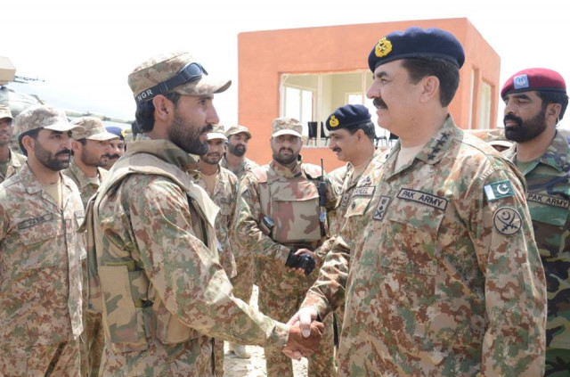 coas shakes hand with a soldier during his visit to wazirstan on august 12 2015 photo ispr coas shakes hand with a soldier during his visit to wazirstan on august 12 2015 photo ispr