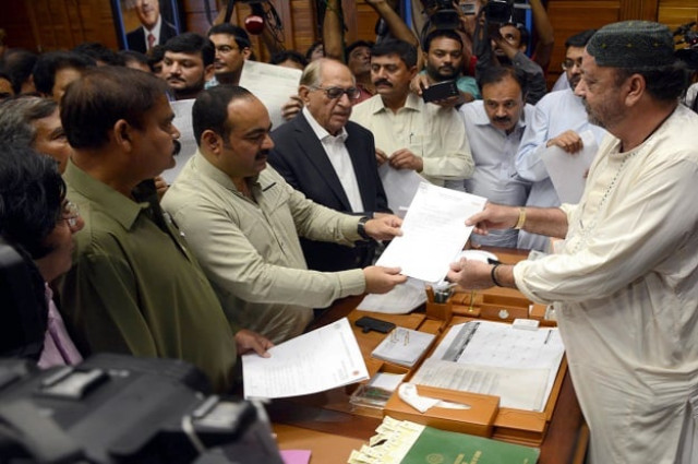 mqm parliamentarians submitting their resignations to the speaker photo express mqm parliamentarians submitting their resignations to the speaker photo express