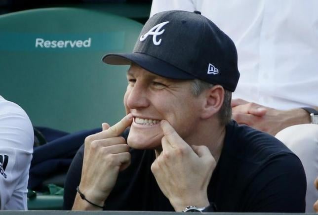 german footballer bastian schweinsteiger gestures during the match between ana ivanovic of serbia and bethanie mattek sands of u s a at the wimbledon tennis championships photo reuters