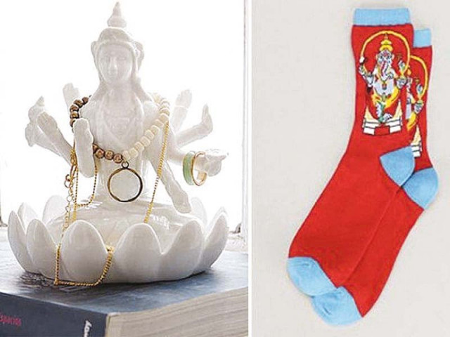 ceramic stand depicted the multi armed hindu deity lakshmi sitting on a lotus photo file ceramic stand depicted the multi armed hindu deity lakshmi sitting on a lotus photo file