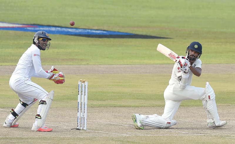 the tourists replying to sri lanka s first innings total of 183 took their overnight total of 128 2 to 375 all out just before stumps on the second day photo afp