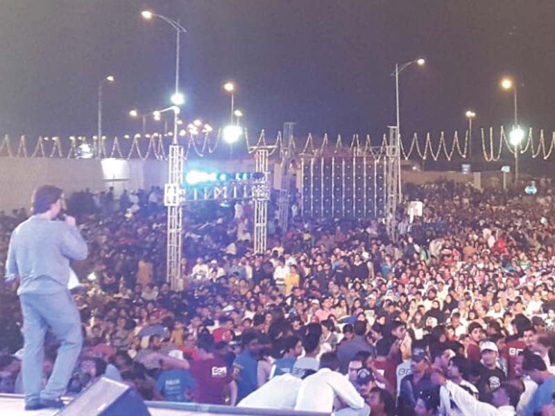 a large number of people enjoy music at bahria town s family azadi festival photo pr