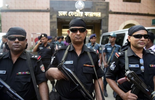 bangladeshi security personnel stand guard outside the main prison in dhaka photo afp