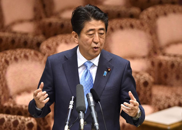 says future generations of japanese should not have to keep apologising for the mistakes of the past photo afp