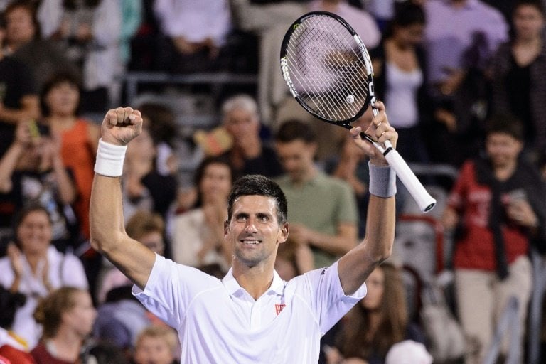 djokovic celebrates as he defeats gulbis 5 7 7 6 9 7 6 1 photo afp