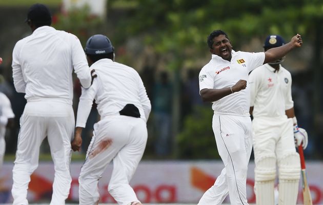 sri lanka 039 s rangana herath r celebrates with his teammates after taking the wicket of india 039 s harbhajan singh not pictured during the fourth day of their first test cricket match in galle august 15 2015 photo reuters