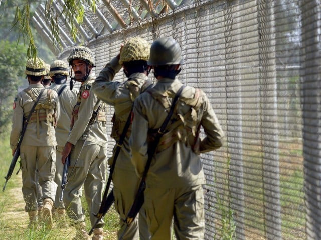 pakistani security forces seen along the loc photo afp pakistani security forces seen along the loc photo afp