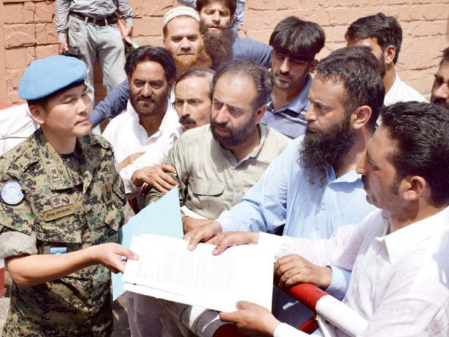 ajk leaders present a memo against india addressed to un chief ban ki moon to the un military observers group in india and pakistan photo nni ajk leaders present a memo against india addressed to un chief ban ki moon to the un military observers group in india and pakistan photo nni