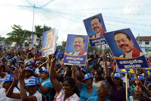 supporters of former sri lankan president and parliamentary candidate mahinda rajapakse gather at a rally in gampaha on august 14 2015 photo afp