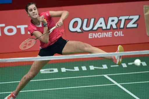 world number one carolina marin defended her women 039 s singles title on sunday with a two game victory over indian second seed saina nehwal photo afp world number one carolina marin defended her women 039 s singles title on sunday with a two game victory over indian second seed saina nehwal photo afp