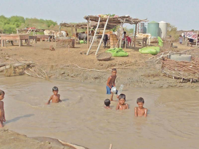 nearly all the houses of the abdul ghani chachar village have been razed to the ground in the recent floods a mosque built by an ngo is the only structure saved from the mighty flood s wrath meanwhile the residents of the village who have enough grain in stock for sustenance ask only for a school for their children photos express