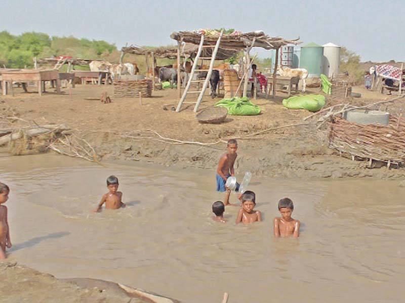 nearly all the houses of the abdul ghani chachar village have been razed to the ground in the recent floods a mosque built by an ngo is the only structure saved from the mighty flood s wrath meanwhile the residents of the village who have enough grain in stock for sustenance ask only for a school for their children photos express