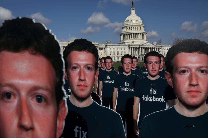 dozens of cardboard cut outs of facebook ceo mark zuckerberg sit outside of the us capitol building as part of an avaaz org protest in washington us april 10 2018 photo reuters