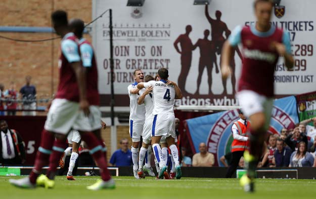 leicester city 039 s japanese striker shinji okazaki c celebrates with teammates after scoring during the english premier league football match between west ham united and leicester city at the boleyn ground in london on august 15 2015 photo afp