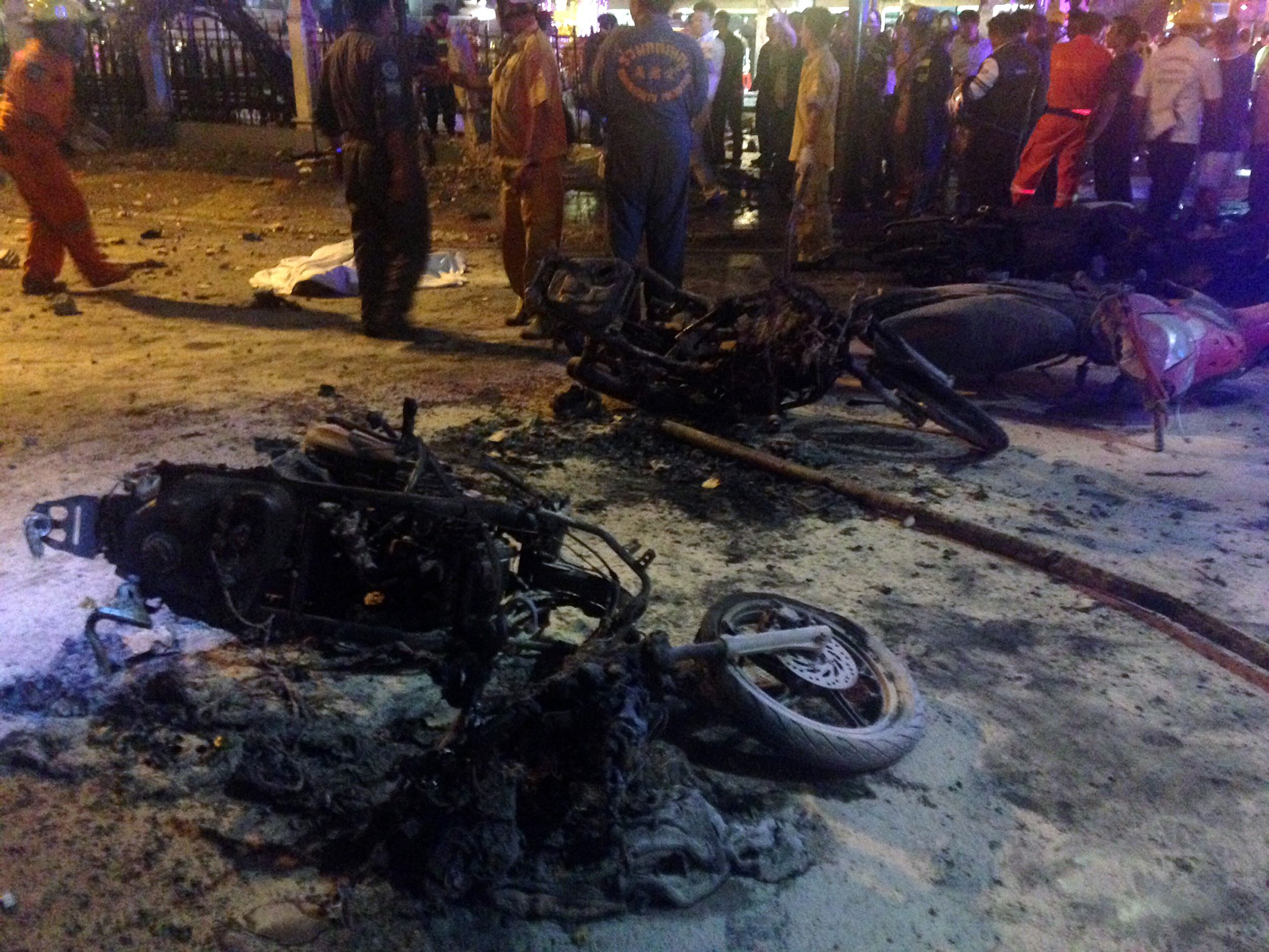 destroyed motorbikes are pictured at the scene of devastation after a bomb exploded outside a religious shrine in central bangkok late on august 17 2015 killing at least 16 people and wounding scores more body parts were scattered across the street after the bomb went off outside the erawan shrine in the downtown chidlom district of the thai capital photo afp