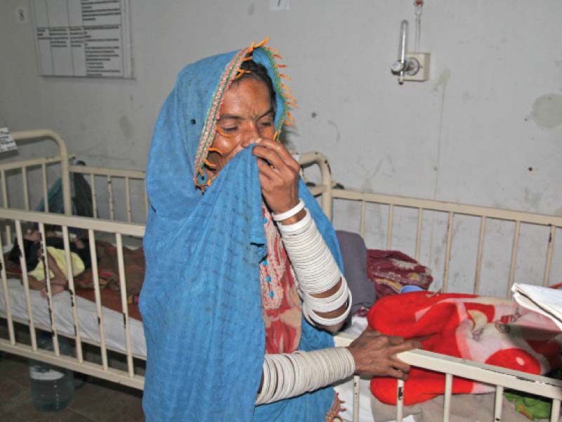 the condition of public hospitals in the province is so dilapidated that patients prefer not to approach them until it is often very late this woman has brought her child to the civil hospital mithi but complains of the lack of facilities at the hospital photo file