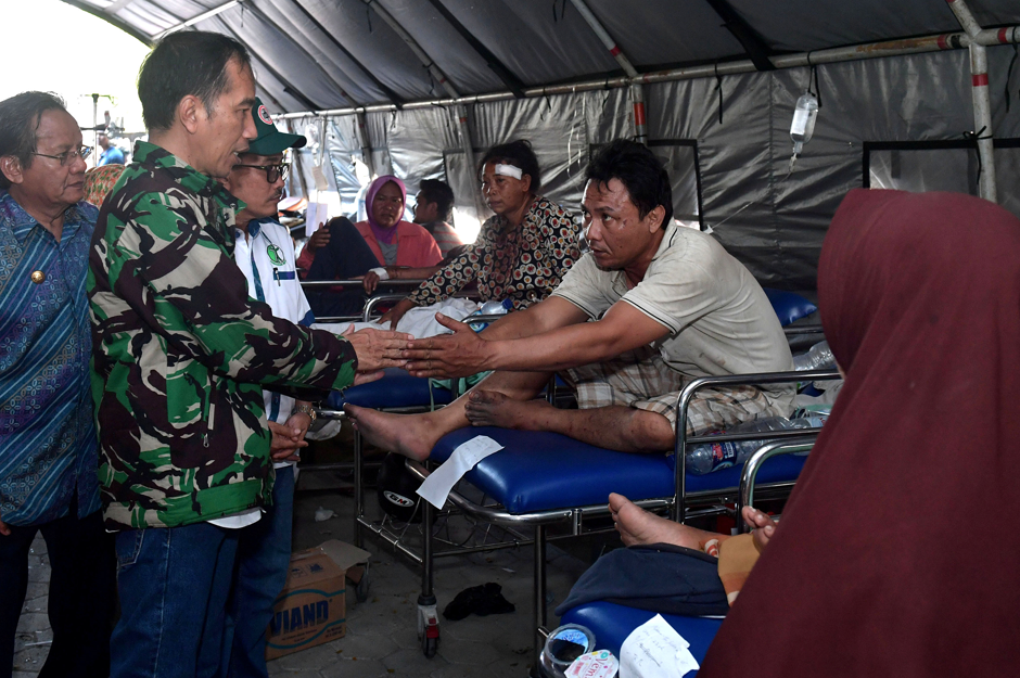 Indonesian President Joko Widodo vists the area affected by an earthqquake and tsunami in Palu, Sulawesi, Indonesia. Reuters