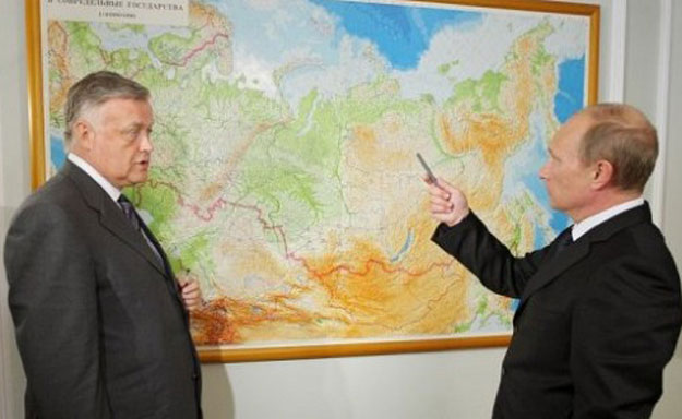 vladimir yakunin left with vladimir putin in moscow on june 11 2011 photo afp