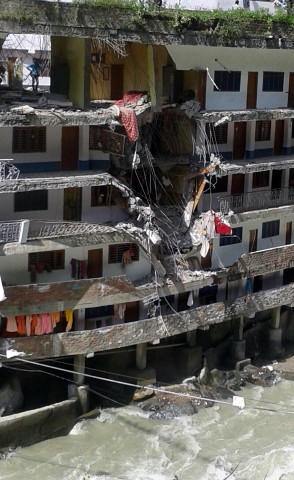 the damaged building of the famous sikh shrine gurdwara manikaran sahib is pictured at manikaran in the kullu district of northern himachal pradesh state on august 18 2015 photo afp the damaged building of the famous sikh shrine gurdwara manikaran sahib is pictured at manikaran in the kullu district of northern himachal pradesh state on august 18 2015 photo afp