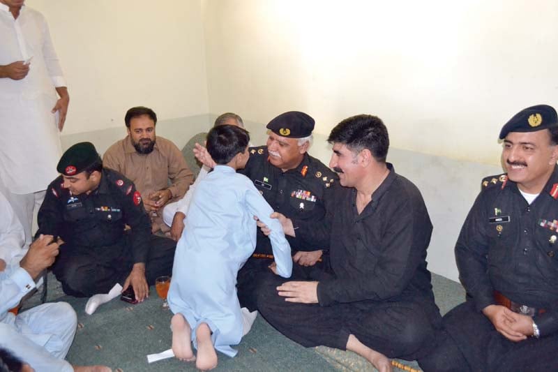 hussain shah with his father and levies officials at a news conference photo express