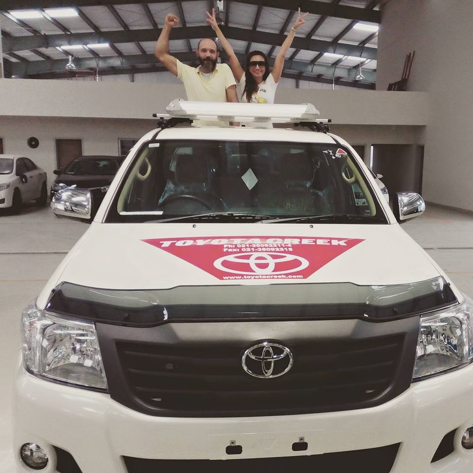 fiazan haque l and anoushey ashraf r atop the car that they will drive all the way to khunjerab pass from karachi photo courtesy wandering pakistanis facebook page